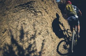 A rider moving around an interesting-looking rock feature during stage three of the Berg and Bush 'Great Trek'. Photo: Em Gatland