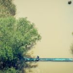 An aerial view of a rider crossing the suspension bridge across the Tugela River. Photo: Em Gatland