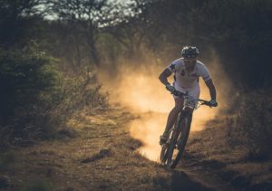 A rider descending a dusty section during stage two of the Berg and Bush 'Great Trek'. Photo: Em Gatland