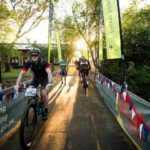 Riders moving through the entrance and exit from the race village on stage two of the Berg and Bush 'Great Trek'. Photo: Em Gatland