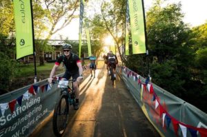 Riders moving through the entrance and exit from the race village on stage two of the Berg and Bush 'Great Trek'. Photo: Em Gatland