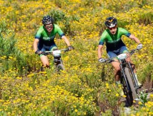 Candice Lill (left) and Adelheid Morath moving through a fynbos section during stage one of the Wines2Whales Chardonnay. Photo: Greg Beadle