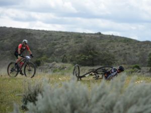 A rider on the ground after taking a fall during stage one of the Cape Pioneer Trek. Photo: Marike Cronje