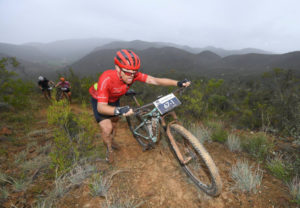 Cape Pioneer Trek stage five rider through water