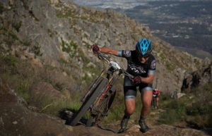 Jennie Stenerhag pushing her bike up a tough and steep climb on stage one of the Wines2Whales Chardonnay. Photo: Greg Beadle