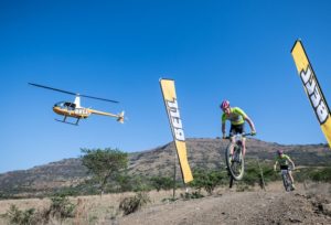 Winning men's pair Matthys Beukes and Philip Buys taking on a ramp during stage three of the Berg and Bush 'Descent'. Photo: Em Gatland/Nikon
