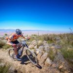 A rider pictured moving over a rocky section during stage one of The U MTB Stage Race. Photo: Chris Hitchcock