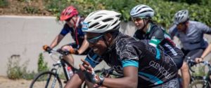 A rider waving to the camera during the 947 Cycle Challenge. Photo: 947 Cycle Challenge