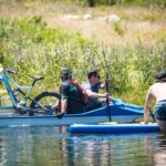 Riders taking it easy in a raft during the Origin of Trails. Photo: David Tarpey