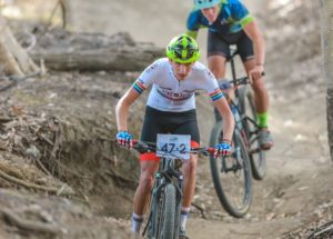 Riders moving on a slight downhill singletrack section during stage two of the Sanlam MTB Invitational today. Photo: Henk Neuhoff Photography