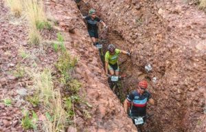 Riders moving in between a narrow rocky trench during the sixth Trailseeker Series event. Photo: Facebook/Nissan Trailseeker