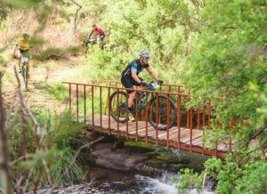 A rider moving over a bridge during the sixth Trailseeker Series event. Photo: Facebook/Nissan Trailseeker