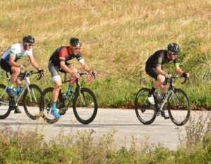 Riders moving alongside a long grass section during the Steak Race. Photo: Sakkie/Masterspe