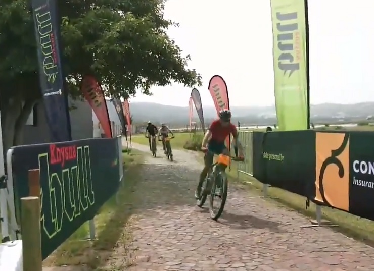HB Kruger crossing the finish line on stage two of the Knysna Bull to beat Alan Hatherly and Matt Beers in the final sprint. Photo: Twitter/@knysnabull