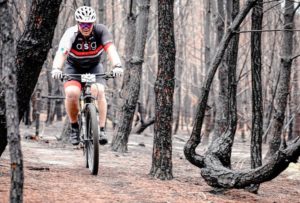 A rider moving through a dry forest section during the TransCape MTB Encounter. Photo: Jacques Marais