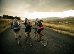 A group of mountain bikers support each other during the X-Berg Challenge